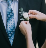 groom getting pinned