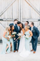 group shot infront of barn doors